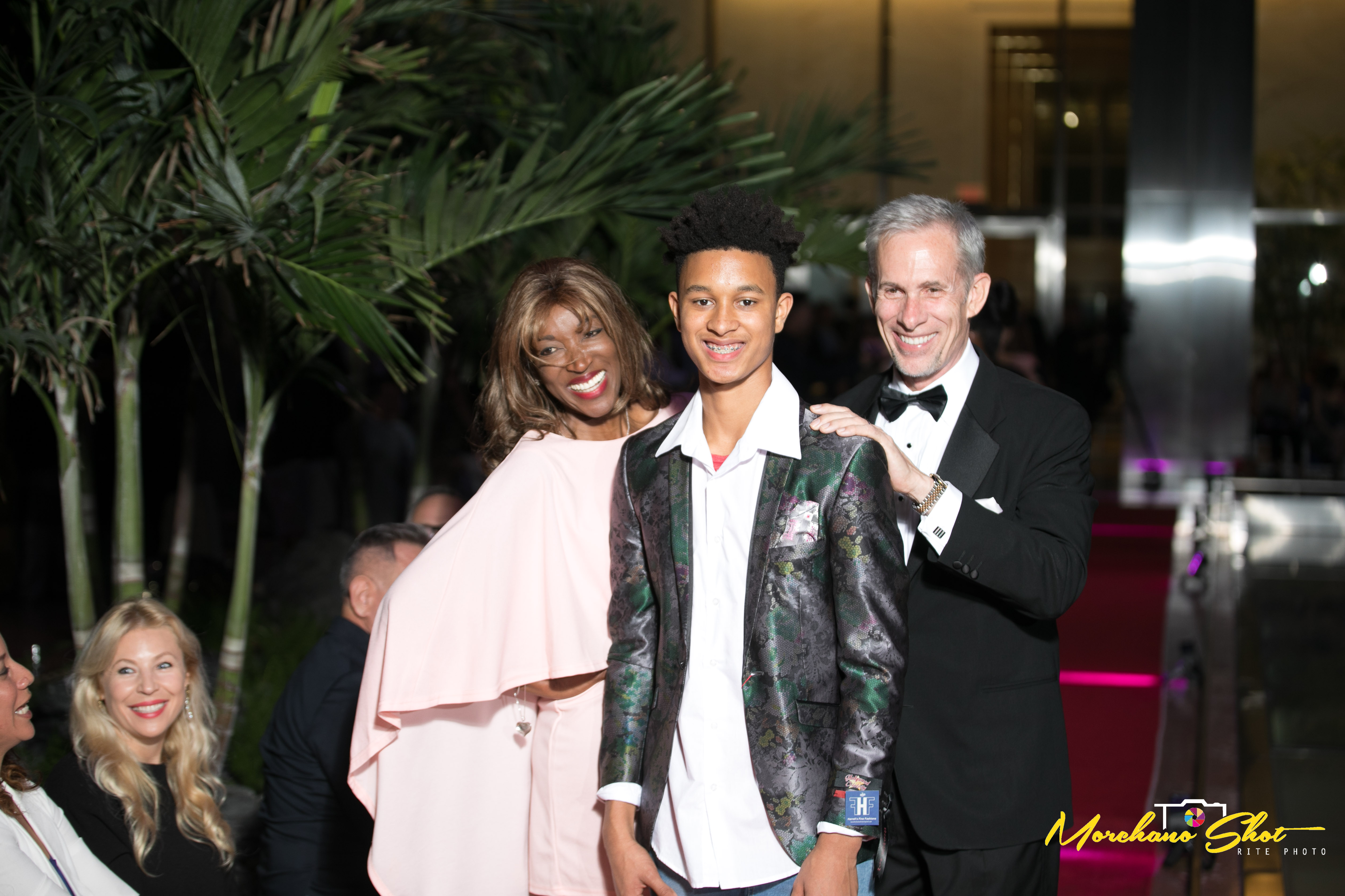 Fashion Night on Brickell Founder Mayra Joli and event Co-host Steven Befera on the runway at Fashion Night on Brickell 2018